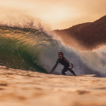 surfing in morocco during sunset